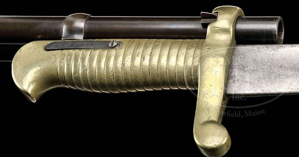 Bayonet attached to a Winchester lever-action rifle
